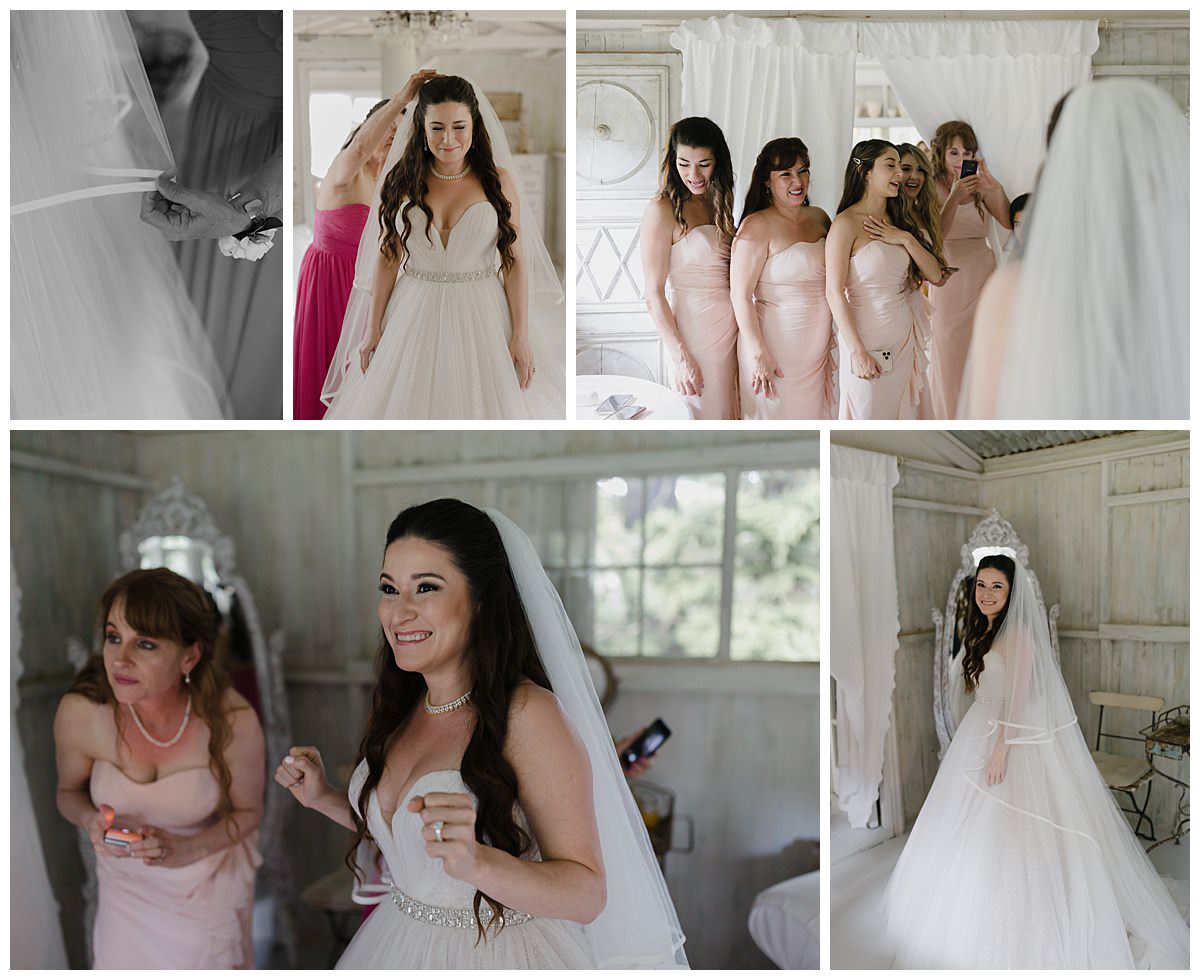 Bride putting her wedding dress on 